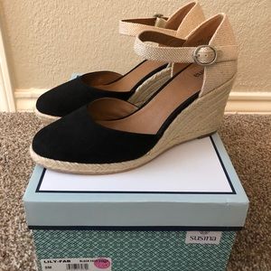 Susina black wedges.